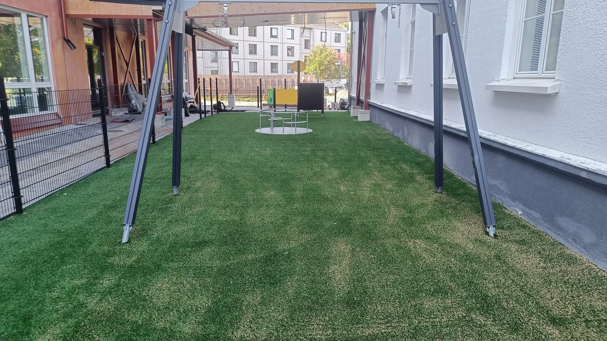 Sand-filled artificial grass installed